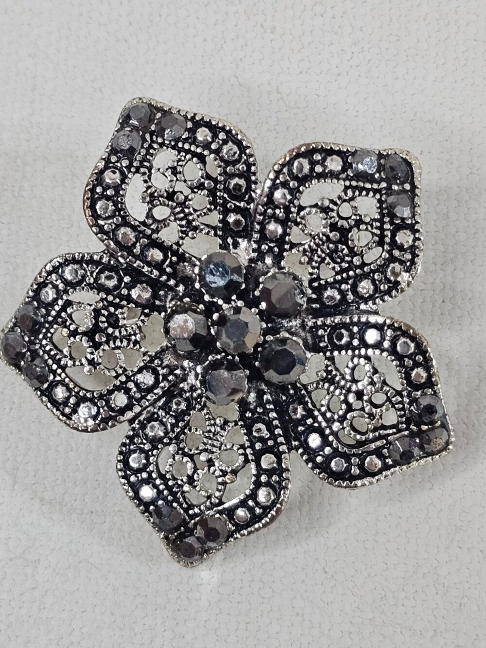 Silver Tone Five Petal Flower Brooch Grey Black Rhinestone Openwork Unmarked Pin